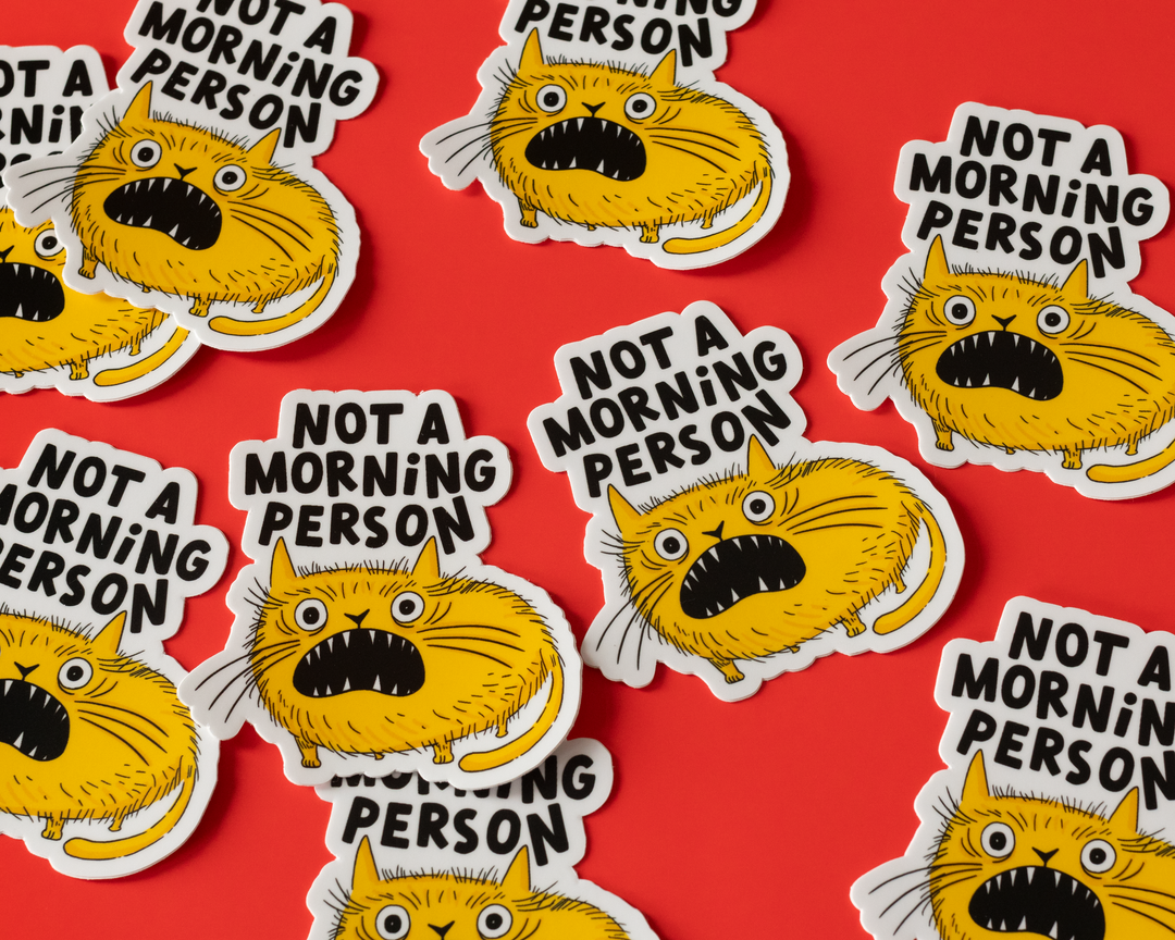 Stickers with cartoon cat faces and &