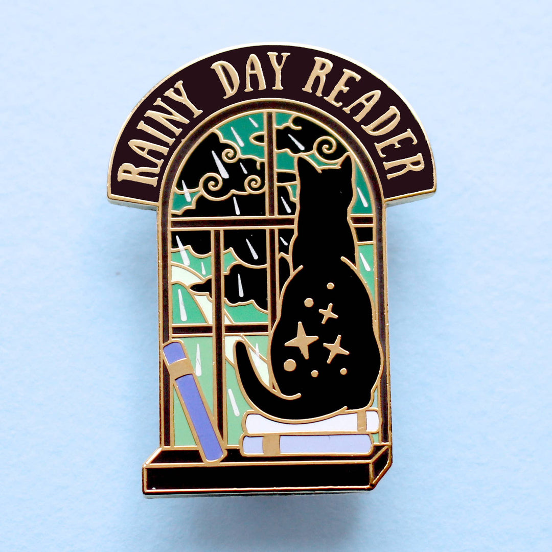 Rainy Day Reader Cat Enamel Pin