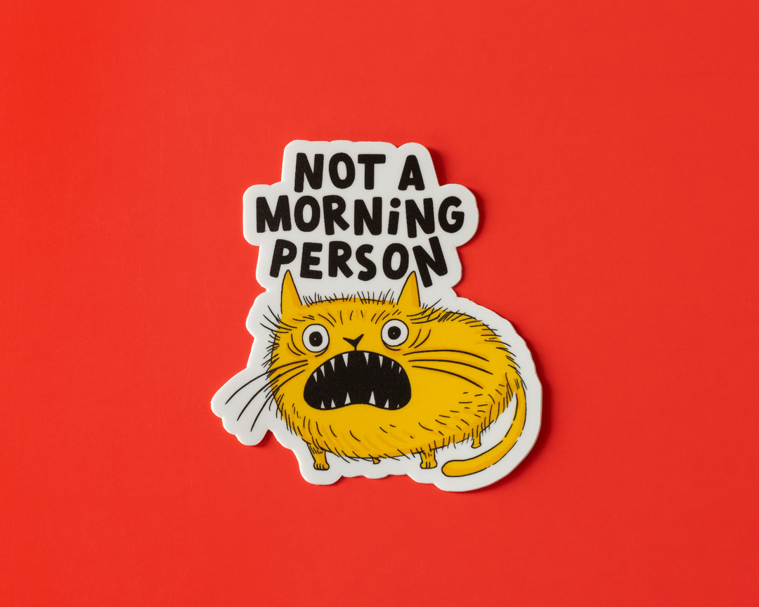 Sticker of a cat with &