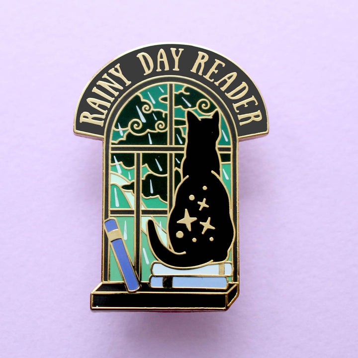 Rainy Day Reader Cat Enamel Pin